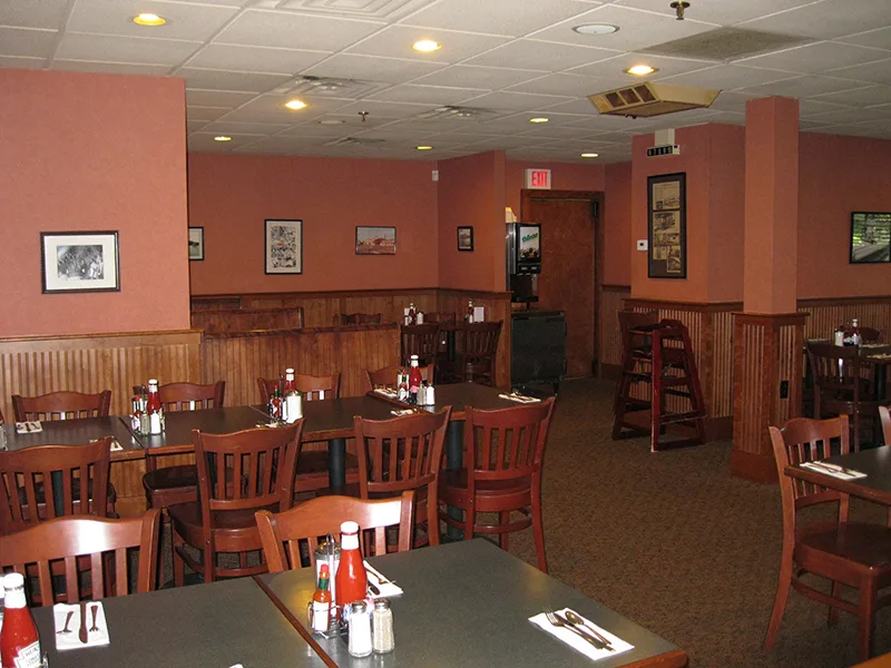 The Good Days dining room with vintage photos on the walls